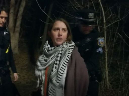 Police arrested this woman protesting at Sen. Carper's house. Why the case didn't stick