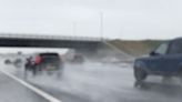 Motorways lashed by torrential downpours as 'monsoon-like' rain falls