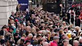 Thousands wait for hours to catch glimpse of Queen’s coffin