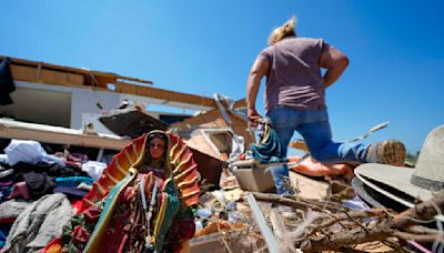 In a north Texas county, dazed residents sift through homes mangled by a tornado