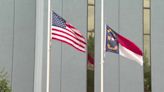 Why will flags in North Carolina be at half-staff on Wednesday, May 15?