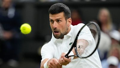 Novak Djokovic moves into Wimbledon semi-finals after Alex de Minaur withdraws with hip injury