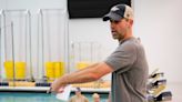 Thomas brings A-10 experience to first year as swimming and diving head coach