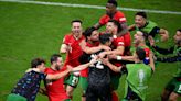 Tears to cheers as Portugal beat Slovenia in shootout