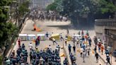 State TV HQ set ablaze, death toll rises as student protests roil Bangladesh