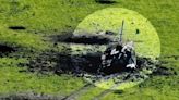 Russian advanced T-90 tank rendered useless after falling into shell hole