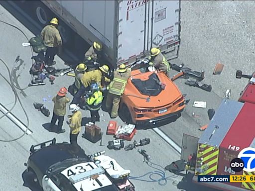 Man injured after Corvette becomes pinned under big rig on 5 Freeway in Castaic