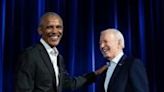 Former US President Barack Obama (L) and President Joe Biden joke around at a fundraiser at Radio City Music Hall in New York City