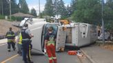 Garbage truck tips over in crash in Nanaimo