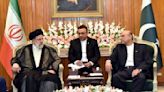 The leaders of Iran and Pakistan vow to boost trade in a meeting seeking to mend a diplomatic rift
