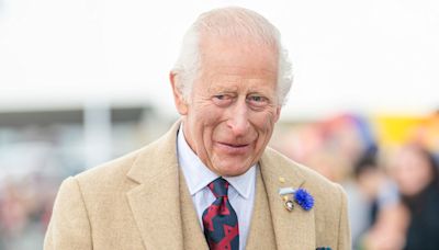 King Charles braves the rain for solo appearance at event loved by late royal