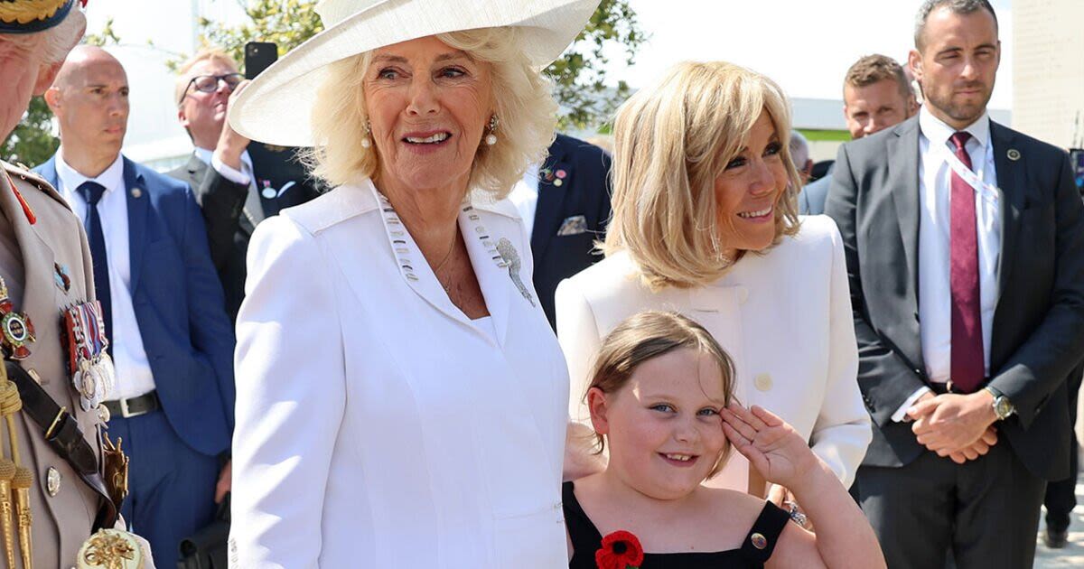 Camilla ambushed by adorable young fan that clings to her while Marcon takes pic