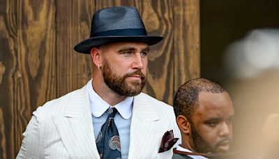 Travis Kelce looks dapper at the Kentucky Derby in pinstripe suit and fedora
