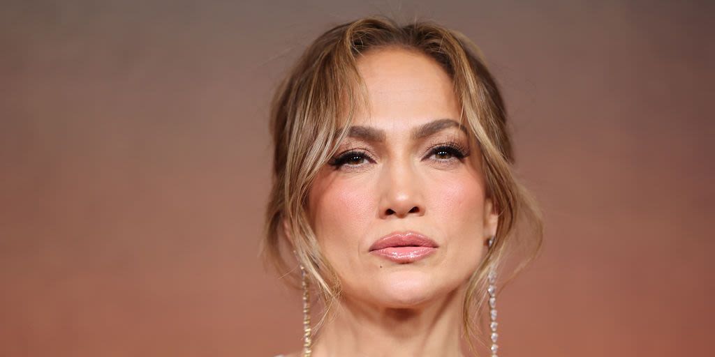 Jennifer Lopez oozes Y2K vibes in all-white outfit and chunky brown belt