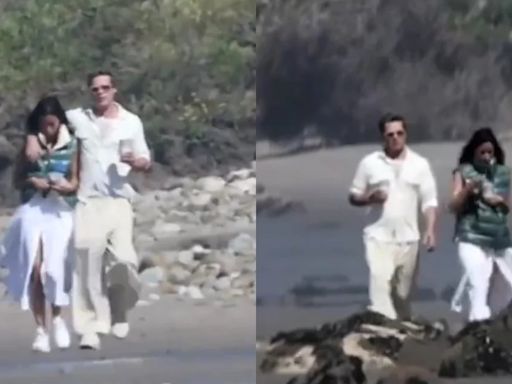 Brad Pitt, pillado con su nueva novia de origen madrileño y 26 años menor dando un paseo por una playa de California