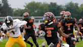 Who earned all-conference honors in Columbus City League football?