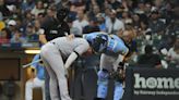 Yankees' Marwin Gonzalez hit in helmet by errant throw from Brewers catcher Victor Caratini