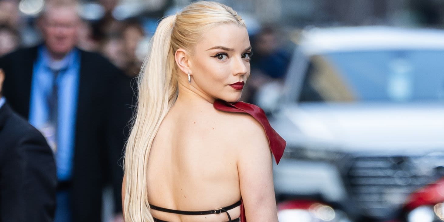 Anya Taylor-Joy flashes her bum in open-back mini dress that laces all the way up