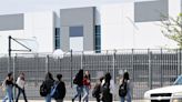 How many Inland Empire schools are next to warehouses?