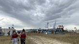 A tale of 2 Black Rock Cities: Burning Man attendees document wildly different experiences, from 6-mile hikes through the mud to dancing the night away