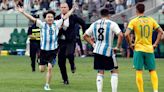 Young Chinese soccer fan gives security the slip to hug his hero Messi mid-game