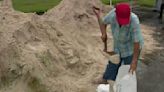 Cities helping residents with sandbags before another round of flooding rain