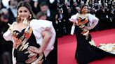 Aishwarya Rai Bachchan walks the 2024 Cannes Film Festival red carpet with a cast on her injured arm