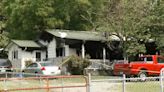Six dead after gunfire, blaze erupt where gunman's estranged wife lived, sheriff says