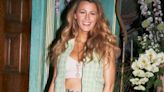 Blake Lively flashes her toned tummy in a bra top