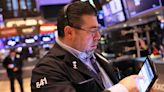 Stock market news live updates: Stocks finish mixed as investors evaluate deluge of earnings