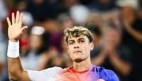 Italy's Flavio Cobolli celebrates a 6-3, 6-2 victory over Felix Auger-Aliassime of Canada at the ATP Montreal Masters