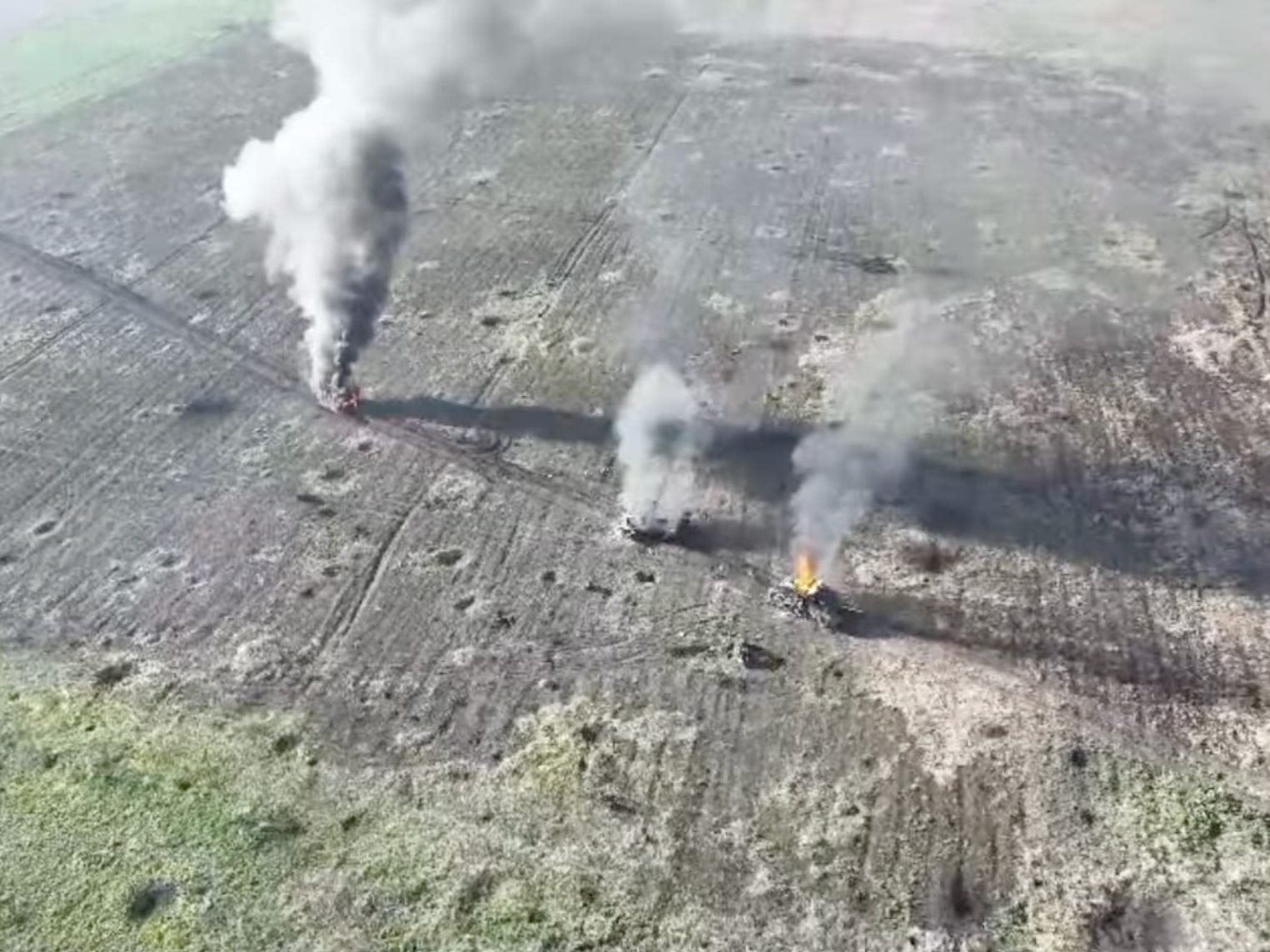 Russia is covering armored vehicles with elaborate anti-drone 'cope cages.' Video shows them getting hit anyway.