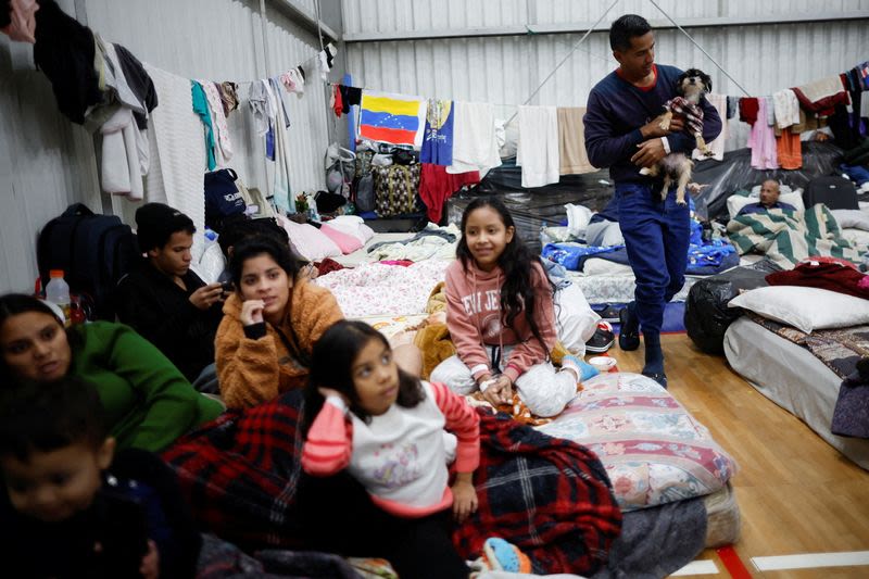 Uprooted by Brazil floods, foreign refugees 'start all over again'