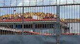 Philippines inmates protest on prison roof over food, warden