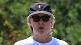 Paul McCartney sports Yeezy-style sliders on beach day with wife Nancy