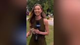 Pardon this interruption! Girl offers hug before reporter goes on live TV