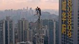 This couple's hobby? Illegally scaling the world's tallest buildings together