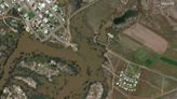 Flooded Australian towns ready levees, sandbags ahead of more rain