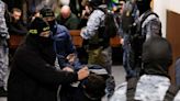8th suspect in Moscow attack appears in court, rights commissioner warns on torture