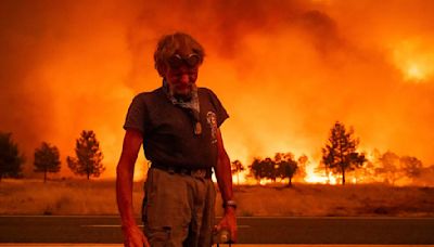 Firefighters helped by cooler weather battle blaze that has scorched area size of Los Angeles