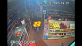 Surveillance video released shows 2 people robbing local liquor store