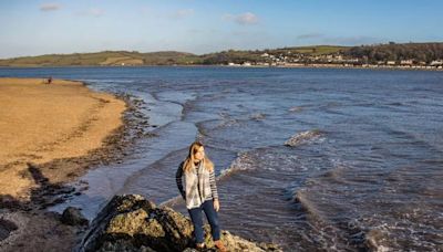 Perfect Welsh village overlooked by castle has vast sandy beach and restaurant of the year