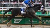 Jockey Florent Geroux is wearing customized Creed pants during the 2024 Kentucky Derby