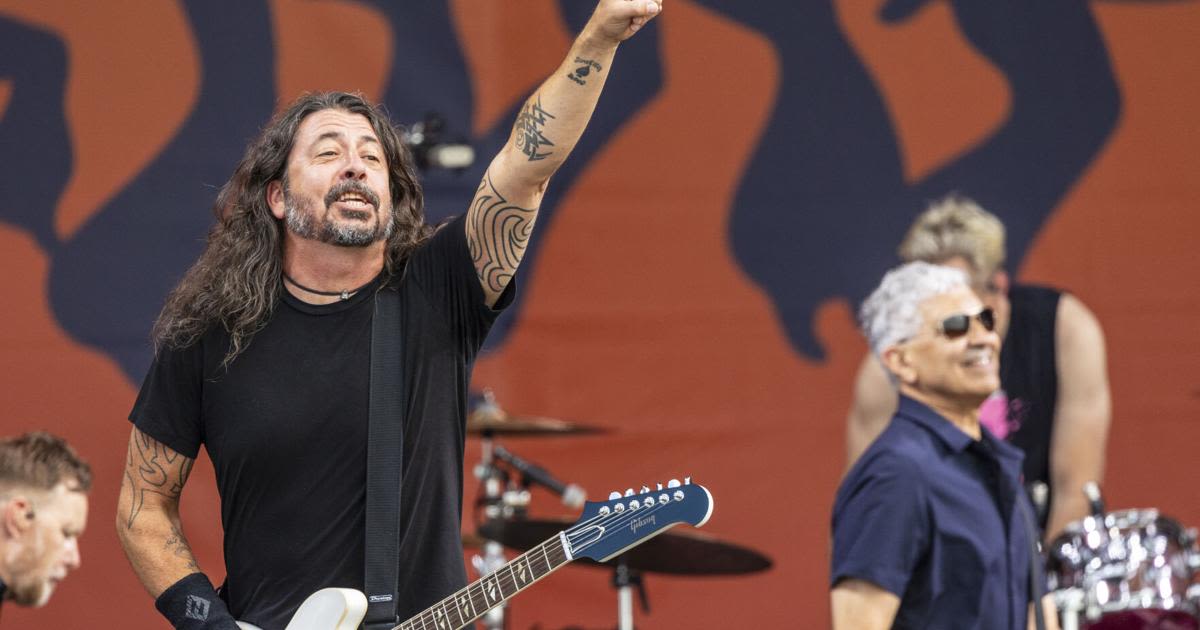Jazz Fest rocked to a close Friday with the Foo Fighters, who saluted Taylor Hawkins