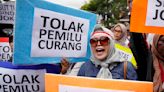 Indonesian activists protest ex-general's win in presidential election and allege massive fraud