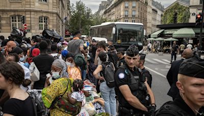 Paris charity workers decry police operations clearing out encampments ahead of the Olympic opening ceremony