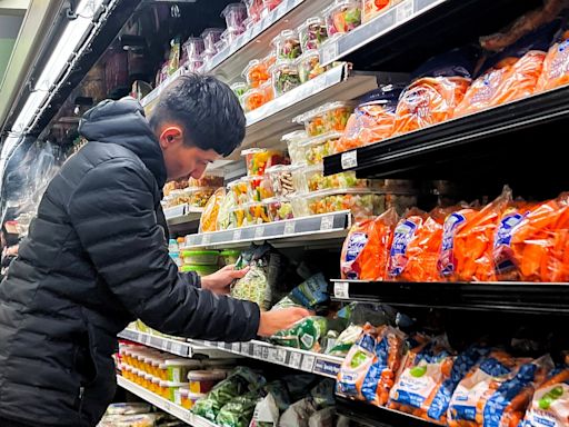 Inflation rises moderately in April, consumer spending slows