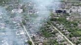 Drone footage shows Ukrainian village battered to ruins as residents flee Russian advance