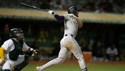 Rockies grab lead in 12th, hold on to beat A's