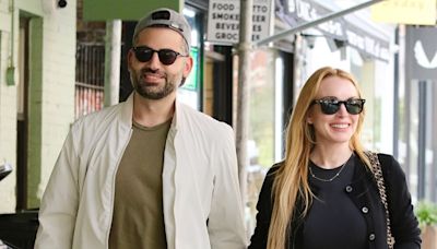 Lindsay Lohan and husband Bader Shammas stroll hand in hand